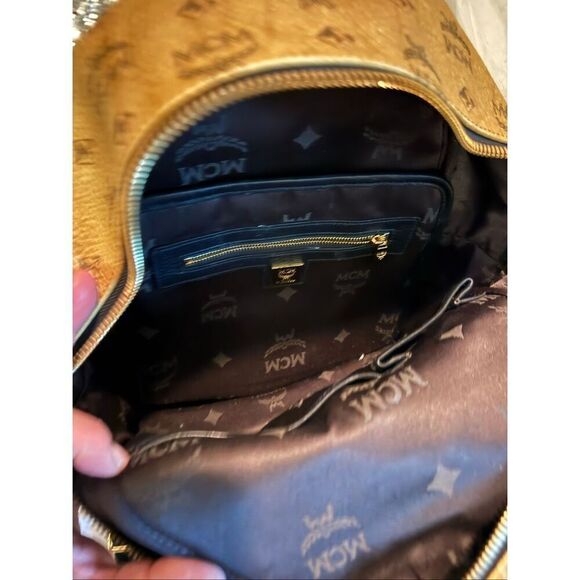 MCM Visetos Dual Stark Backpack convertible crossbody bag studded gold black main image 7